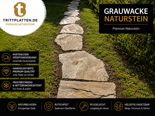 Anwendungsbeispiel mit polygonalen Grauwacke Naturstein-Trittplatten als stilvoller Gartenweg im Rasen. Die robusten, frostbeständigen und rutschfesten Trittplatten eignen sich ideal für Gartenwege, Beete, Terrassen und weitere Außenbereiche.